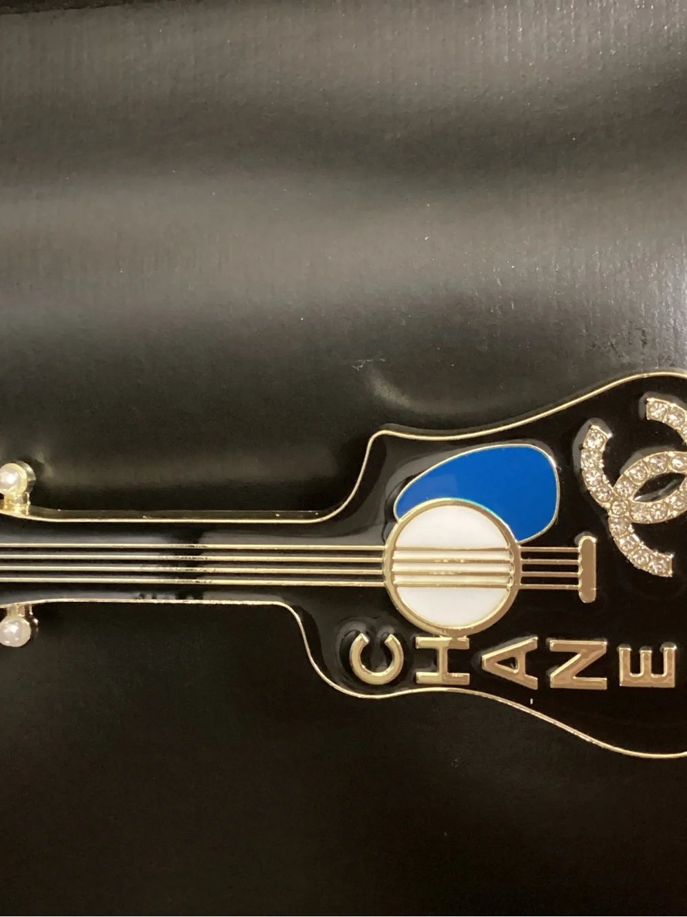 CHANEL Black Enamel Guitar Brooch with Blue Accent